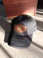 The Black Trucker Leather Patch Cap